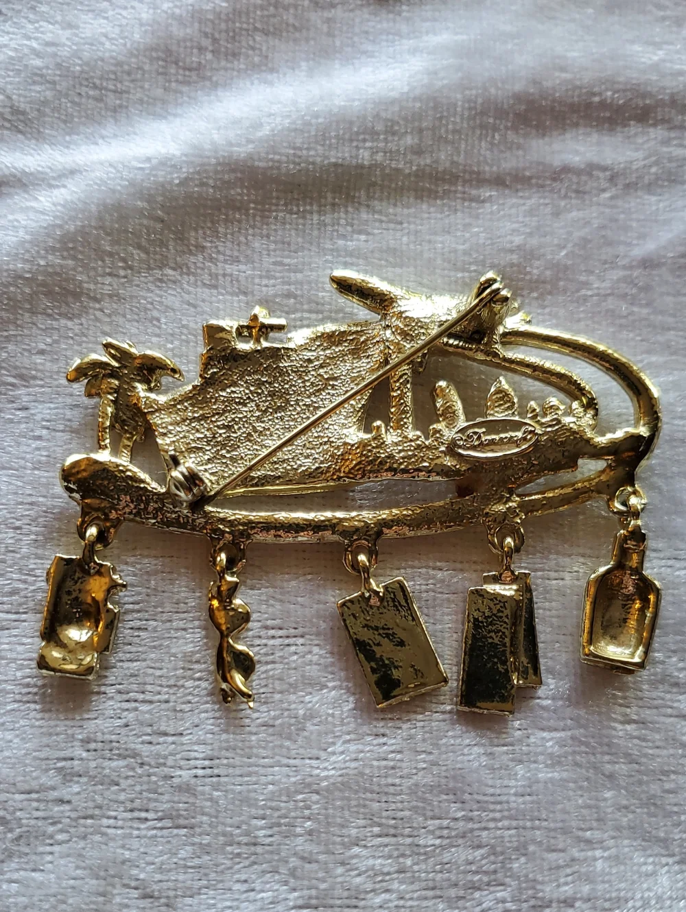 Vintage Gold Tone Cruise & Travel Charm Brooch Signed DANECRAFT